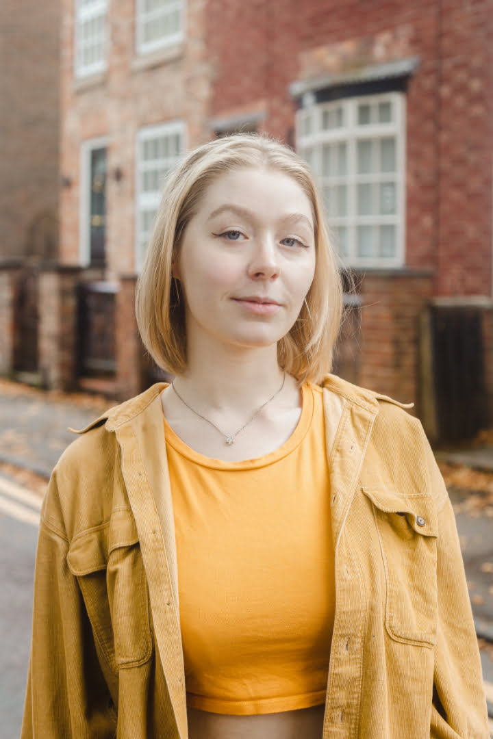 Libby Williamson in a yellow outfit